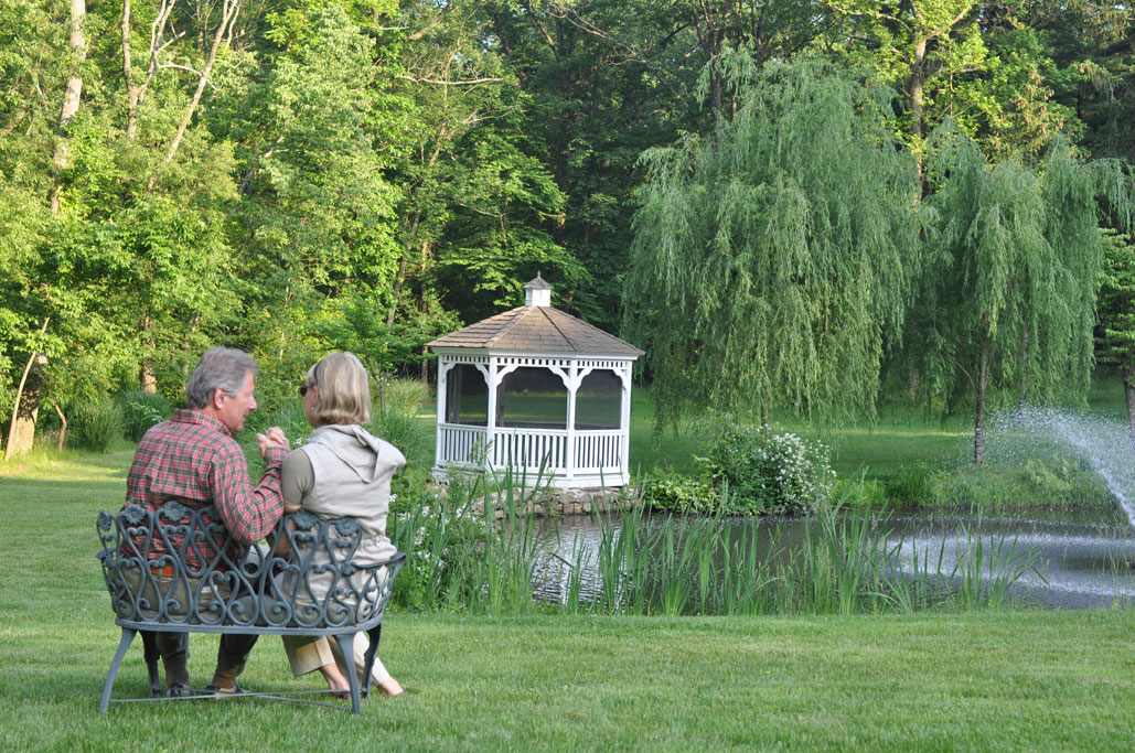 Couple Sitting by The Gazebo